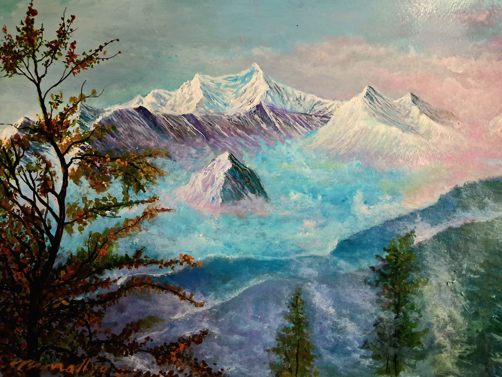 Painting of mountain on board